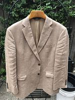 Front view two-button sport coat on hanger