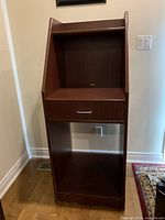 Front view showing overall structure, drawer, open compartments