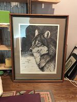 Front view of framed lithograph depicting wolf