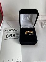Ring in open black presentation box