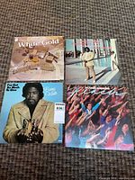 Group shot of all four album covers