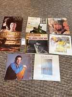 Group shot of all eight LP covers