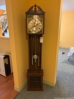 Full view of Beacon grandfather clock showing entire structure and design