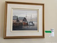 Full view of framed painting on wall
