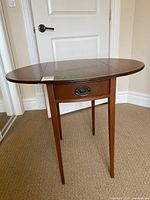 full view of table with leaves raised