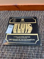 Outer presentation box front showing title and branding