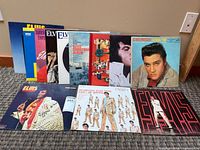 Group shot of twelve Elvis Presley LPs showing front covers