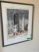 Full view of framed painting under glass
