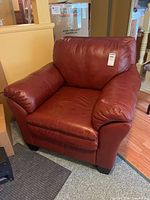 Front view of red leather armchair