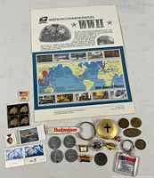 Entire lot showing stamps, tokens, pins, keychains