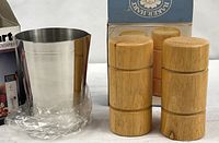 Cuisinart container, plastic wrap, original box, and beechwood salt & pepper shakers with their box