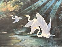 Close-up of egrets and water scene in print
