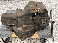 Side view showing full vise, number 4 casting, swivel base, handle