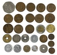 Full overhead view of the 24 foreign coins arranged in five rows