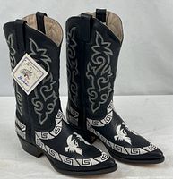 full view of both boots showing embroidery and shape