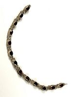 Full view of the sterling silver bracelet showing overall length and stone arrangement