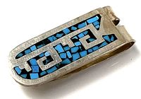 Front view showing turquoise mosaic and overlay design