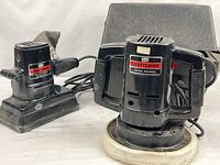 Both Craftsman tools side by side showing size comparison and cords