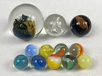 Group shot of all fifteen marbles