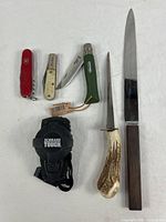 Group shot of all six tools and knives