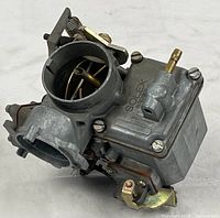 Overall view of Solex Brosol carburetor showing body, choke housing, linkage
