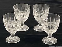 Four crystal goblets front view