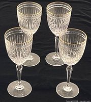 Group of four Waterford Lismore Gold crystal stemmed glasses