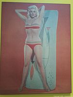 Plaque-mounted magazine photo of Jayne Mansfield in red bikini