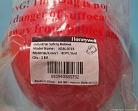 Honeywell label on sealed bag showing model NSB10015, material HDPE, red color