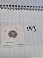 Obverse of 1904 Barber dime in holder