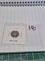 Obverse of 1917-S Mercury dime in labelled 2x2 flip