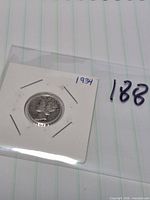 Obverse of 1934 Mercury dime in flip