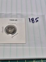 Obverse of 1939 Mercury dime in labelled 2×2 cardboard flip