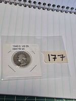 Obverse side of 1943-D Washington quarter in holder