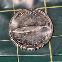 Reverse showing mackerel design and 1967 date