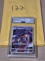 Front view of AGS slab showing Malamar card, grade Mint+ 9.5 and label information