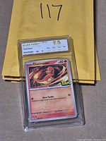 Front of encapsulated Charmander promo card showing NXR Gem Mint 9.5 label and card artwork