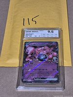 Front view of slabbed Pokémon Team Rocket’s Mewtwo ex card showing grade label and envelope backdrop
