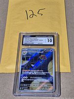 Front view of CGC-encapsulated Pokémon card showing label, grade 10, artwork and certification number