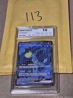 Front view of NXR-slabbed Iron Crown ex card showing GEM MINT 10 label and artwork