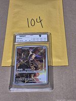 Front view of NXR graded Zamazenta card showing grade Mint 9 and subgrades