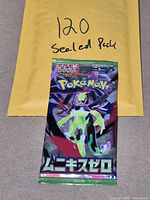 Front view of sealed Japanese Pokémon TCG booster pack with Mega Zygarde artwork, envelope in background