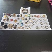 Overview showing all jewellery pieces on cloth and stretch bracelet