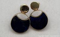 Front view of both 14K gold and lapis stud earrings