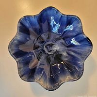 Top view showing six-lobed flower shape and interior glaze