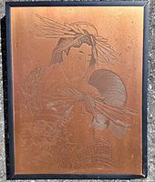 Full view of framed copper etching