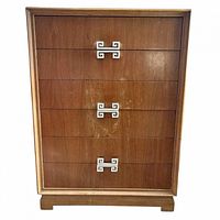 Front view of four-drawer wood highboy dresser showing overall design and hardware