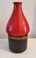 Front view of red and brown German ceramic vase