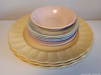 Stack showing all plates and bowl