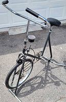 Full view of Fit For Life stationary bike showing frame, wheel, seat, handlebar, gauge